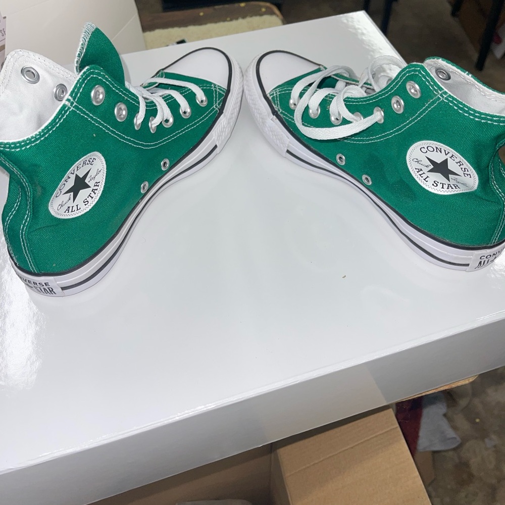 Never before worn Women’s Converse shoes.